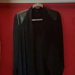 Cardigan T-shirt material,  faux leather trim on shoulders and across back